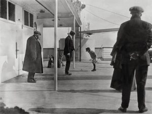 francis browne's photo of a child playing with a toy on the deck of the Titanic